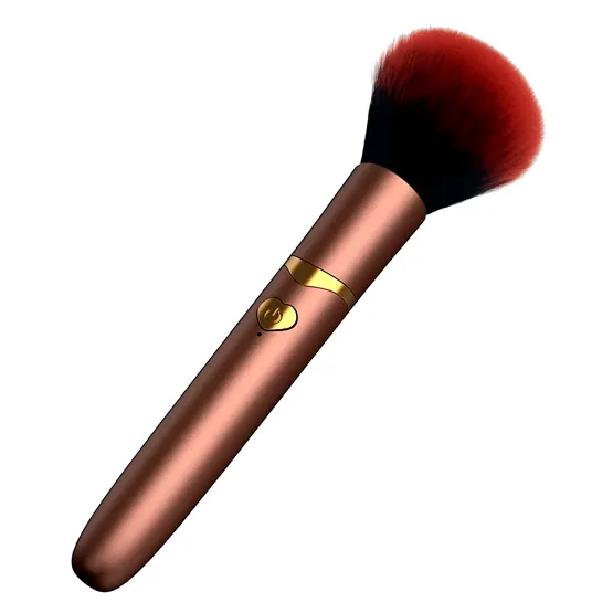 vibrador en forma de brocha de maquillaje
